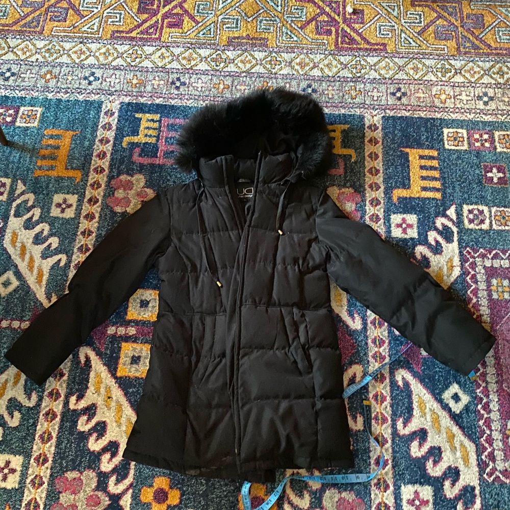 Black puffy Utex Design down jacket with hood.